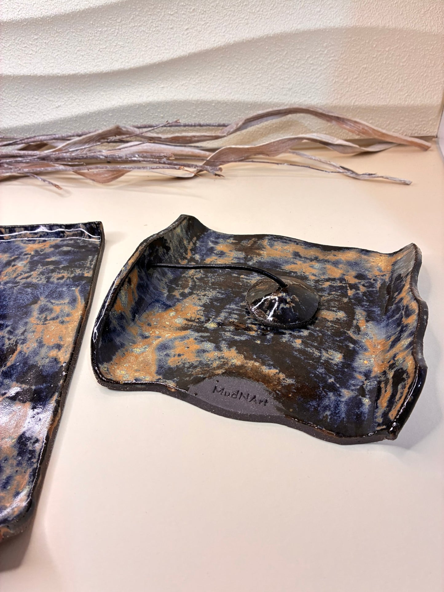 This handcrafted ceramic napkin holder embodies refined simplicity and understated elegance. Meticulously made by hand, each piece reveals subtle variations that celebrate its artisanal craftsmanship. Part of a coordinated tableware set, it is designed to hold napkins with ease while enhancing the overall table setting.