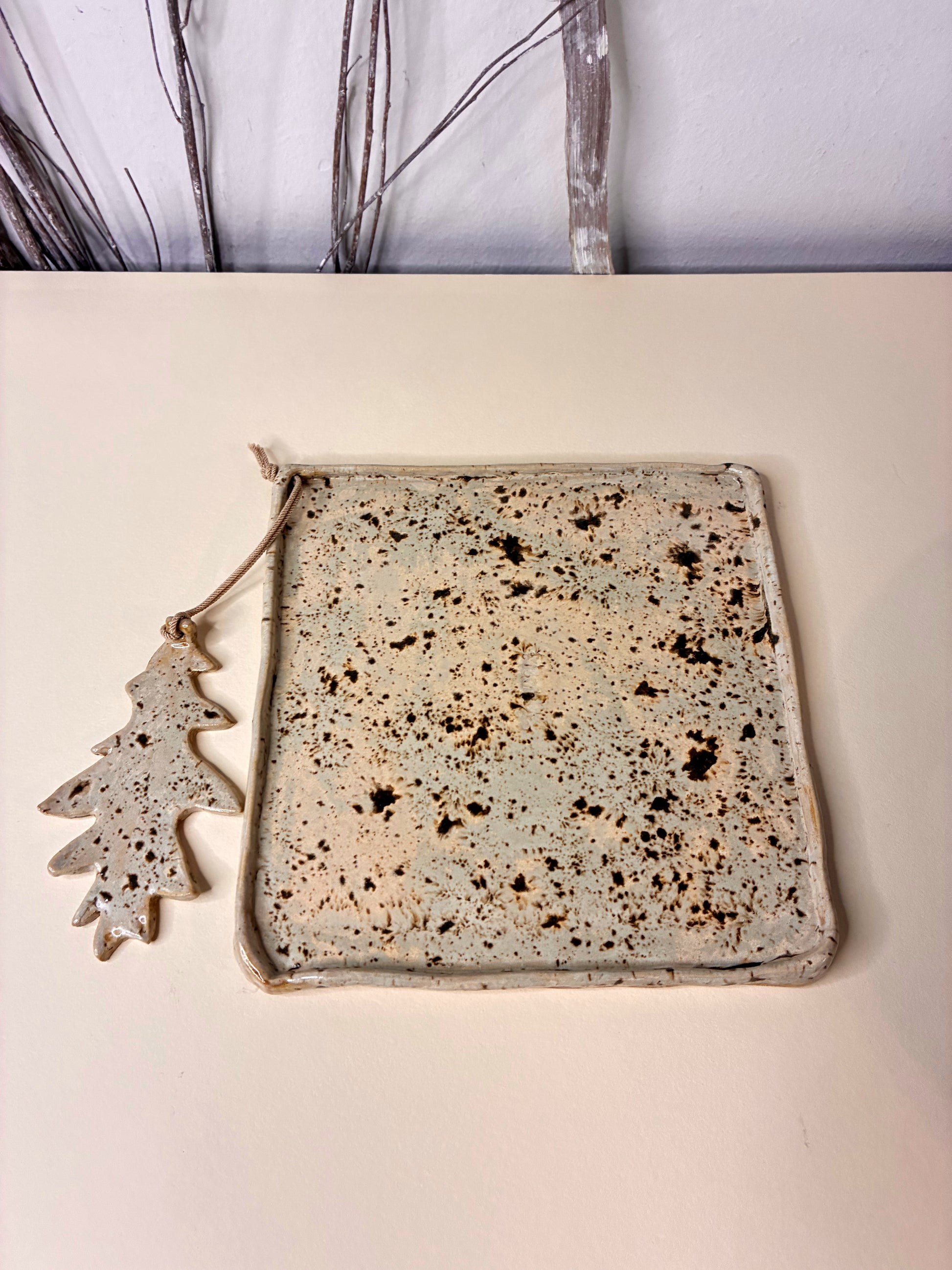 This handcrafted stoneware napkin holder combines timeless design with everyday practicality. Made by hand, each piece features subtle variations that highlight its artisanal character. Both decorative and functional, it adds a refined, natural touch to the table or countertop while keeping napkins neatly in place.